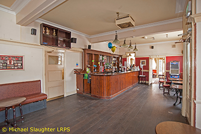 Left-Hand Bar.  by Michael Slaughter. Published on 